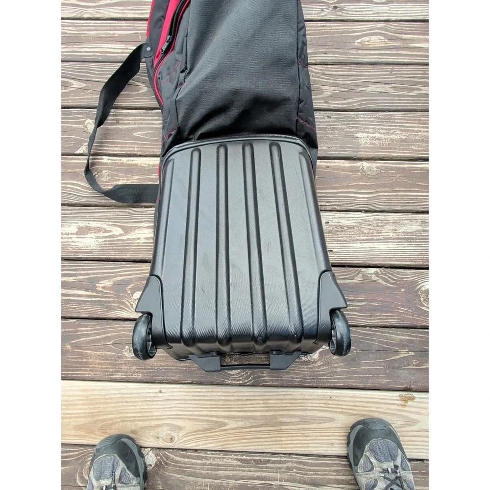 Used Bag Boy Golf Travel Case With Pivot Grip & Wheels - Black and Red